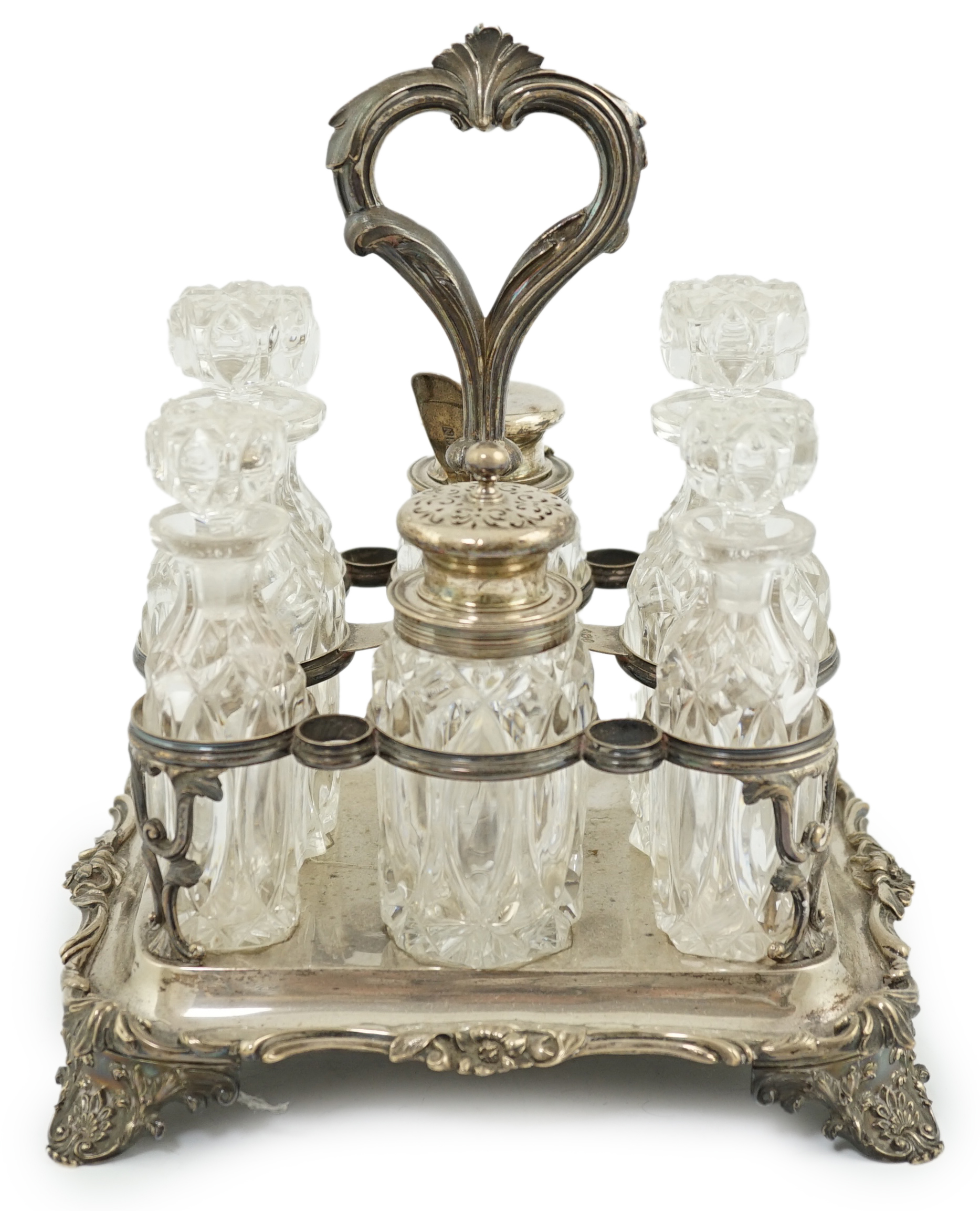 A collection of thirteen assorted late Victorian and later silver topped toilet jars, including blue enamel, tortoiseshell and repousse silver, tallest 9.9cm. Condition - poor to fair to good